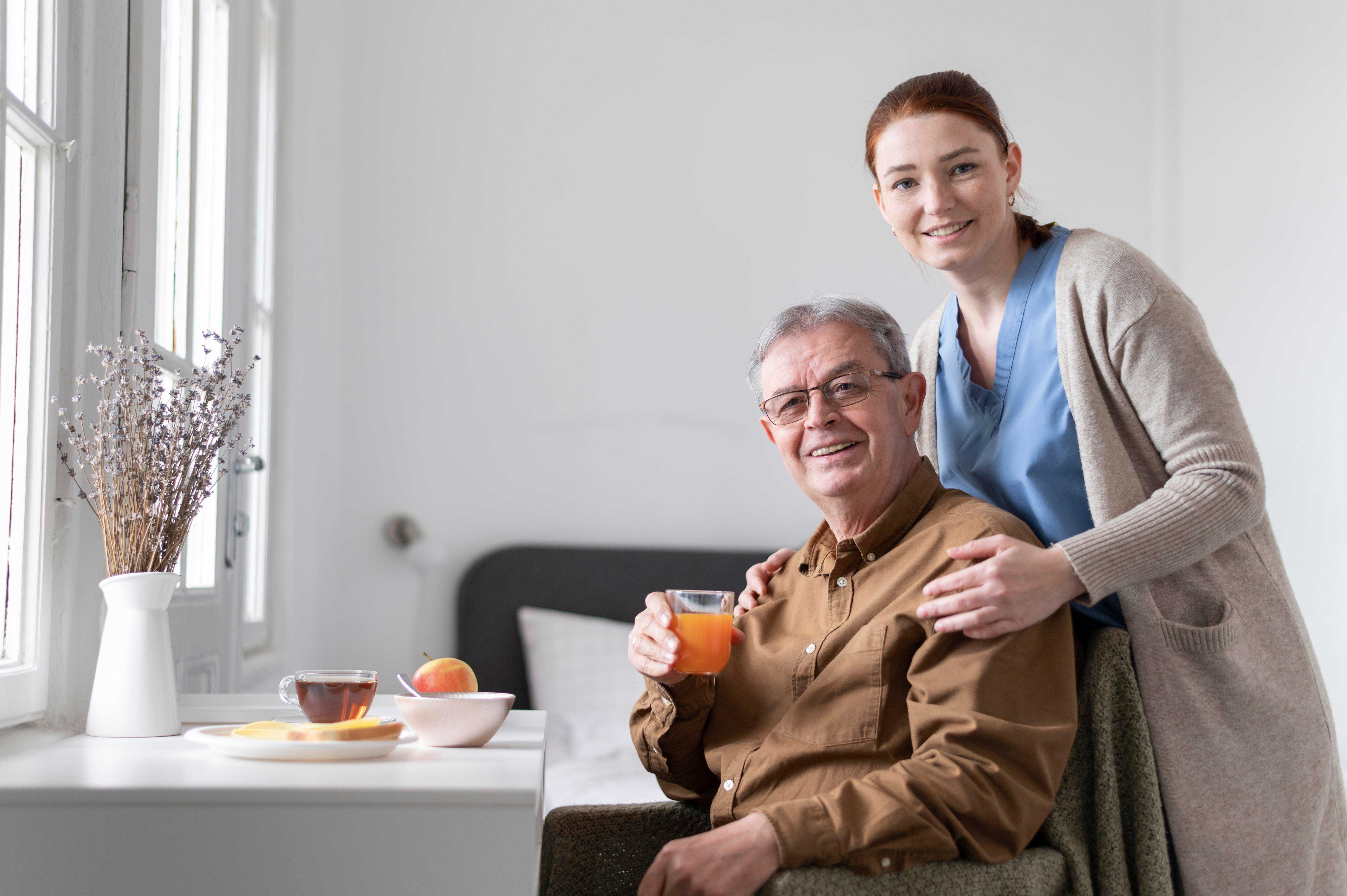 nurse-hugging-senior-person-male