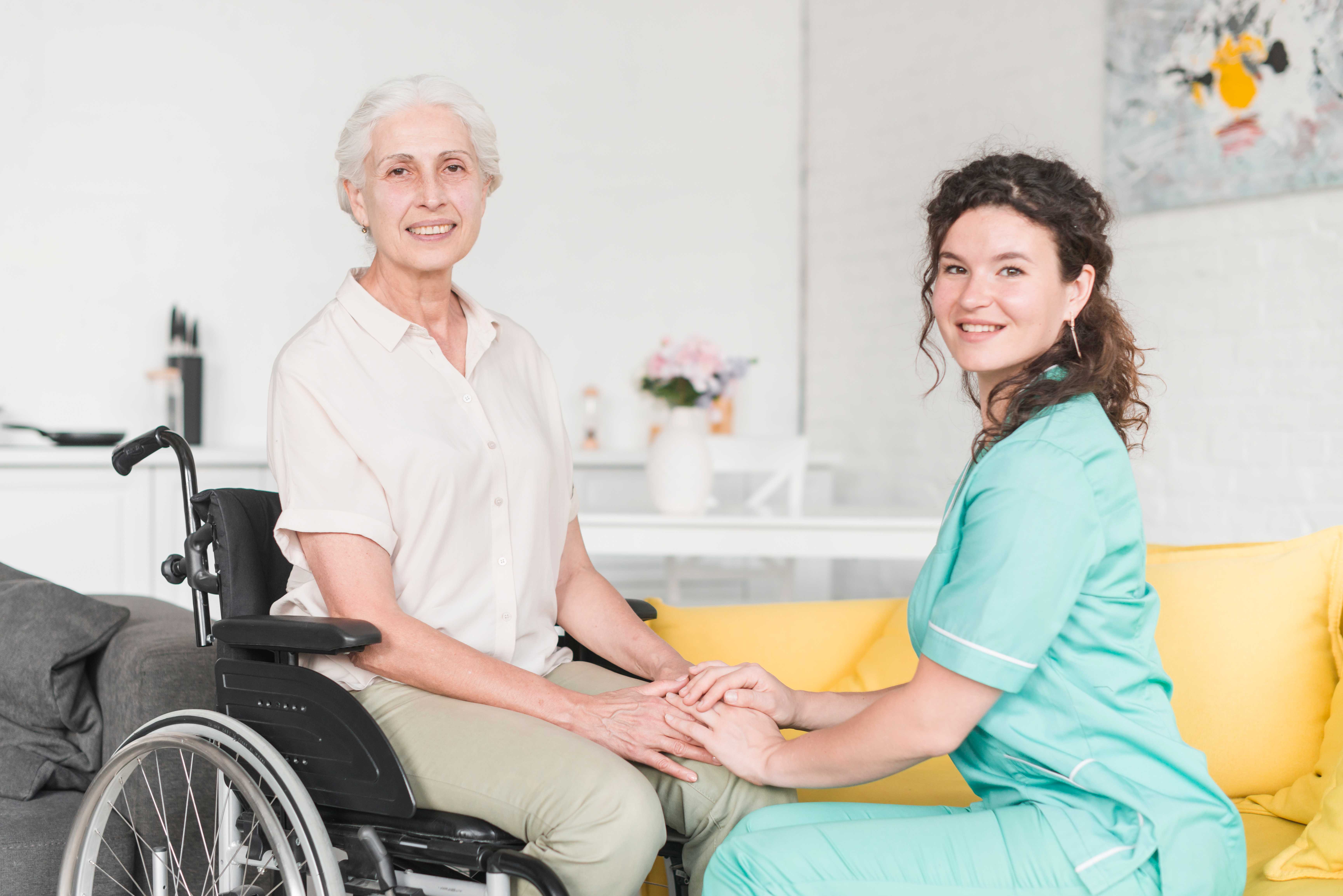 nurse-and-an-senior-woman-holding-hands