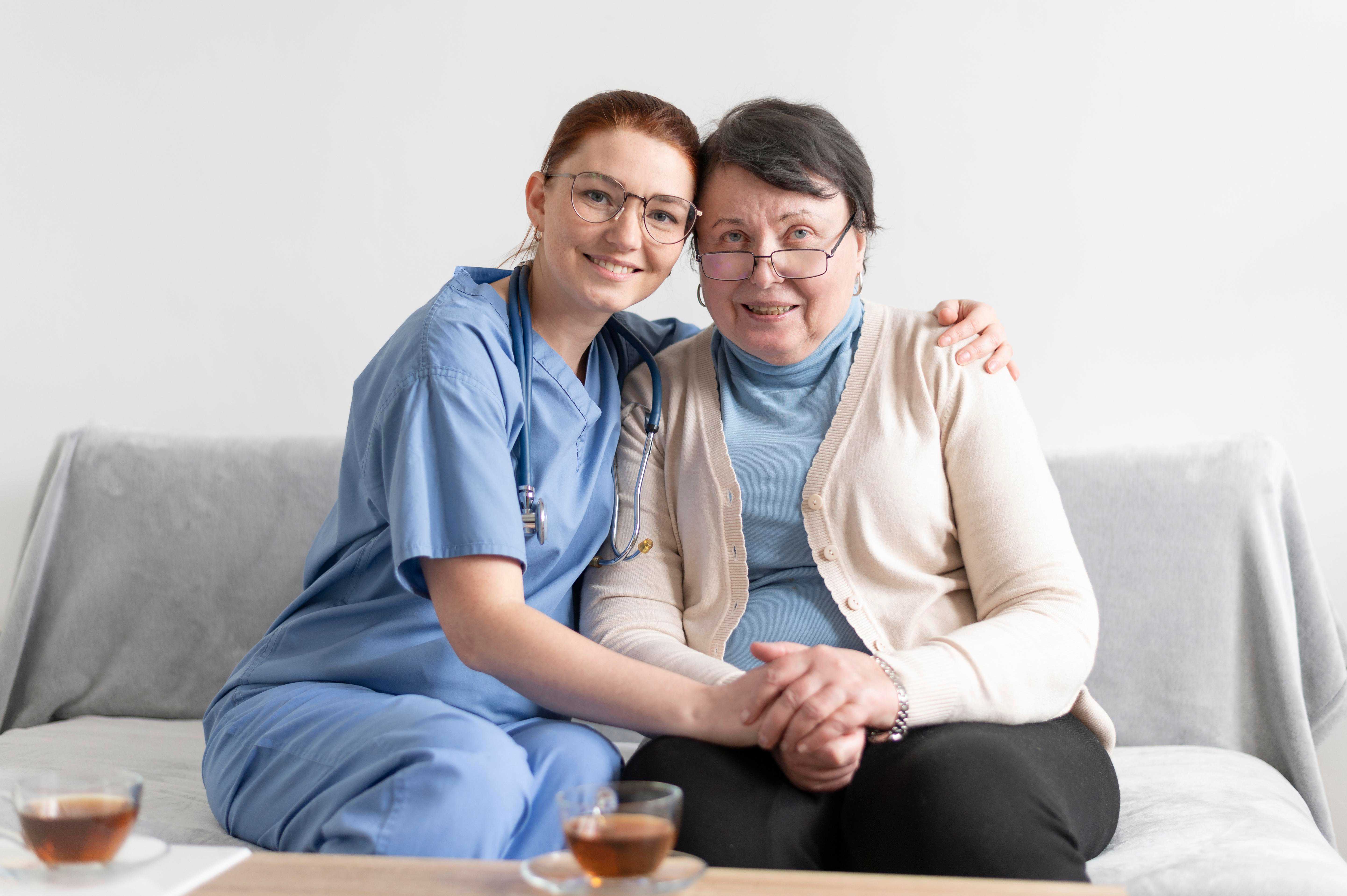 nurse-hugging-senior-person-female
